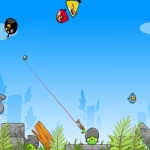 Zöld malac fegyveres támadása Angry Birds játék